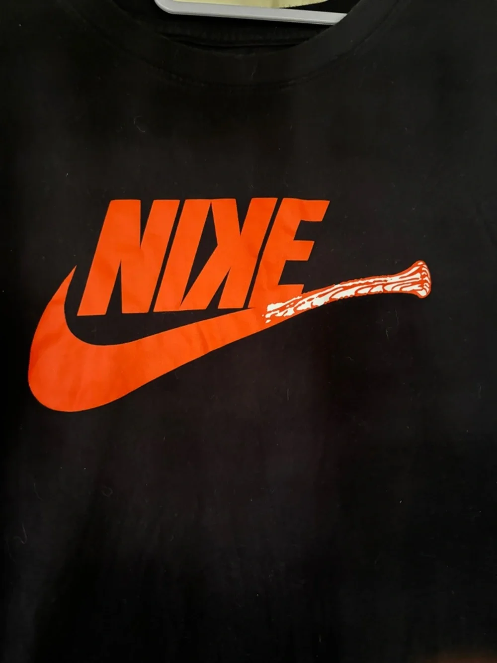 Nike Men’s Black Short Sleeve T-Shirt Orange Logo Bat Strikeout Graphic